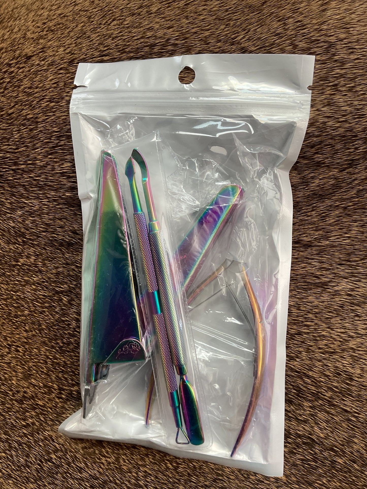 Iridescent nail clipper/cuticle clipper set
